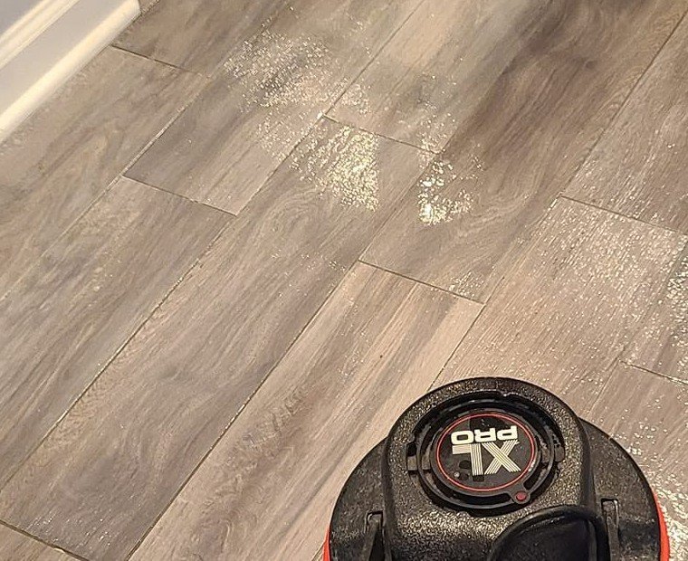 Clean hard floor after service